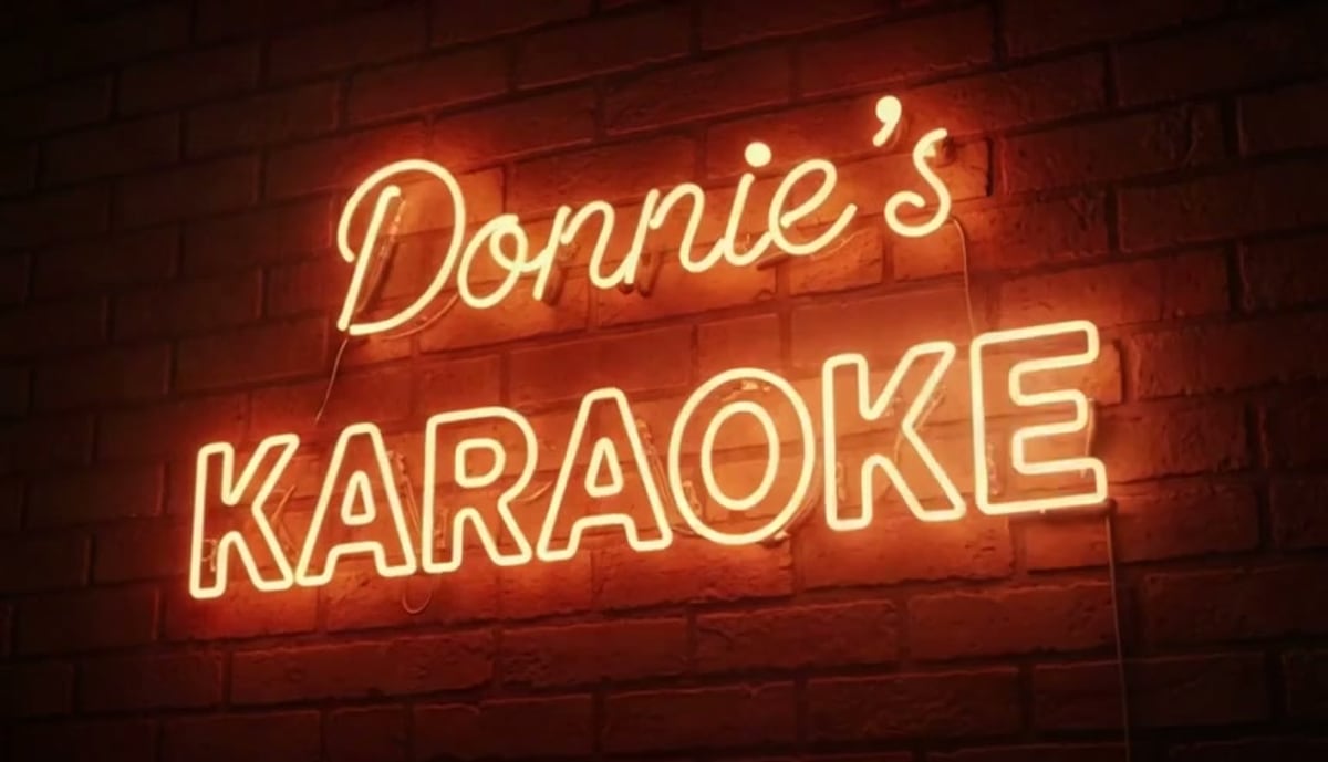 Donnie’s Karaoke neon sign. The two-minute demo is being prepared.
